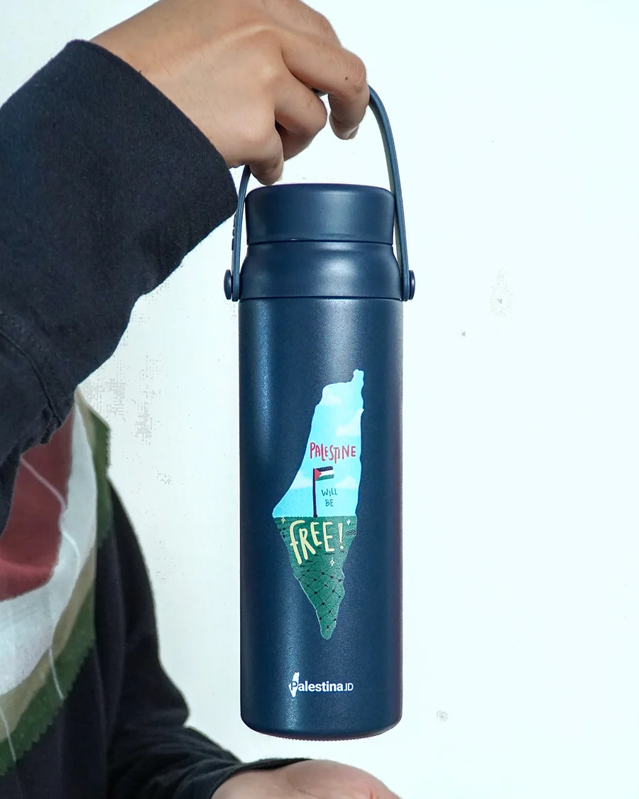 A hand carrying the 450 ml Palestine Will Be Free thermos by its handle
